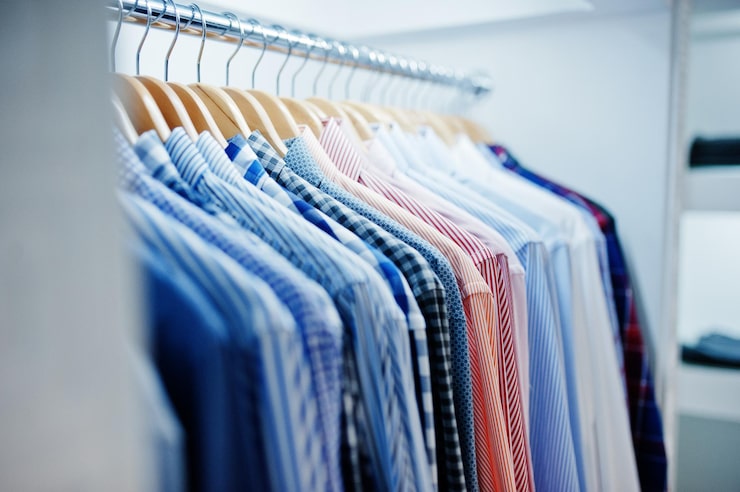 closeup-photo-fashionable-clothes-hangers-shop_627829-6026