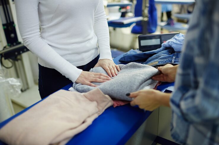 taking-pullover-from-dry-cleaning_1098-16150